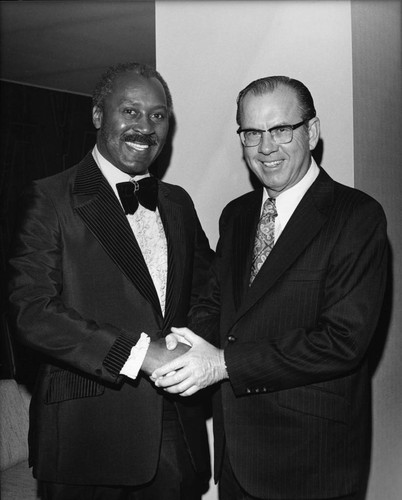 Nate Holden posing with Kenneth Hahn, Los Angeles, ca. 1975