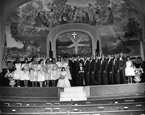 Williams-Bridges bridal party posing together, Los Angeles, 1962