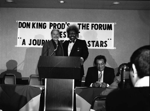 Don King posing with Jerry Bus, Los Angeles, 1985