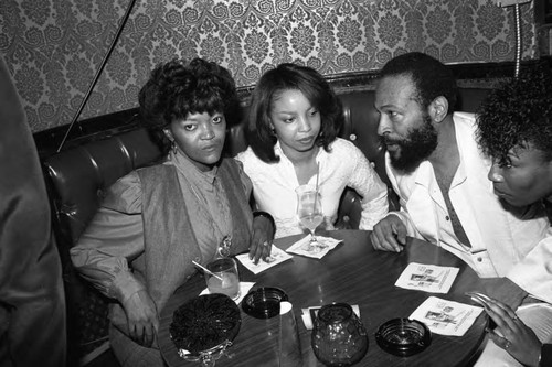 Marvin Gaye talking with guests at the Pied Piper club, Los Angeles, ca. 1983