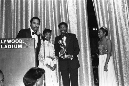 Larry Carroll and Danielle Spencer presenting an award during the NAACP Image Awards, Los Angeles, 1981