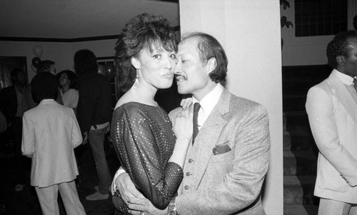 Man and woman at birthday party, Los Angeles, 1985