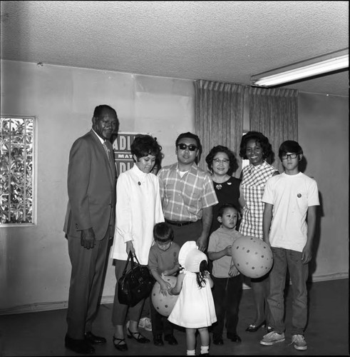 Tom Bradley posing with supporters during his mayoral campaign, Los Angeles, 1969