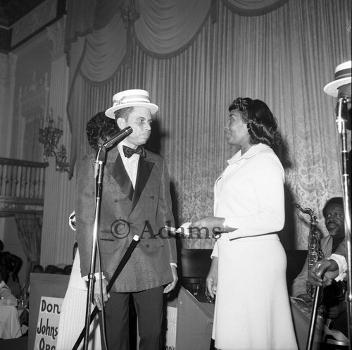 Man and woman on stage, Los Angeles, 1971