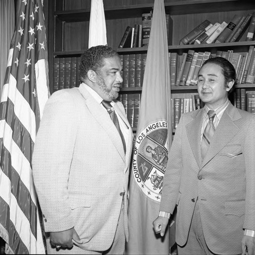 Celes King, III talking with an unidentified man, Los Angeles, 1972