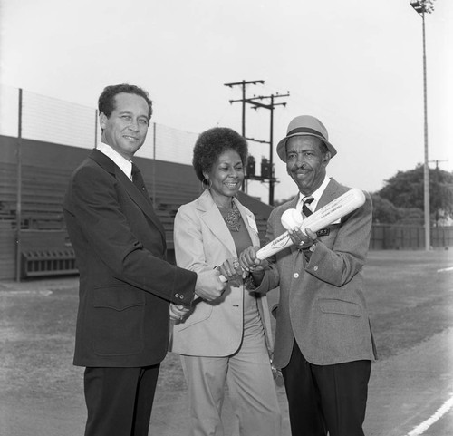 Rachel Robinson posing with Douglas Dollarhide and Charles L. Siler, Sr., Los Angeles, 1973