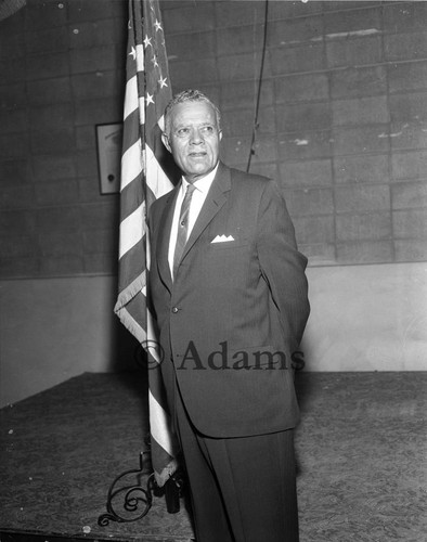 Man with U.S flag, Los Angeles