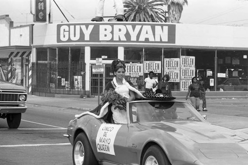 Cinco de Mayo parade Queen riding in a convertible, Los Angeles, 1973