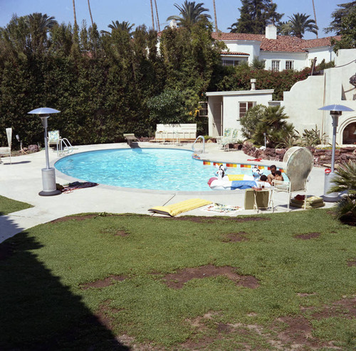 Children around the pool at Berry Gordy's party, Los Angeles