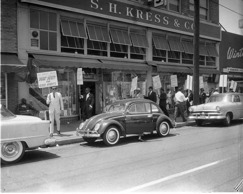 Adam Clayton Powell, Jr. leading a protest of a S.H. Kress & Co. store, Los Angeles, 1960