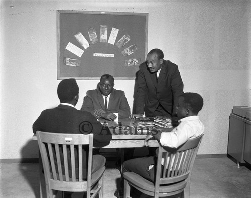 Four men in a meeting, Los Angeles