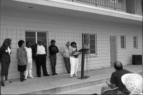 Woman at an Outdoor Lectern, Los Angeles, 1992