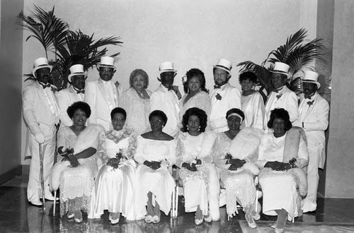 Baton Rougens' Red and White Ball participants posing together, Los Angeles, 1989