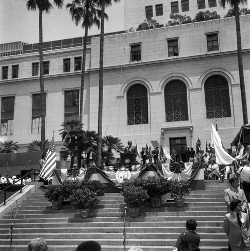 Tom Bradley speaking in front of City Hall during his second inaugural ceremony as mayor, Los Angeles, 1977