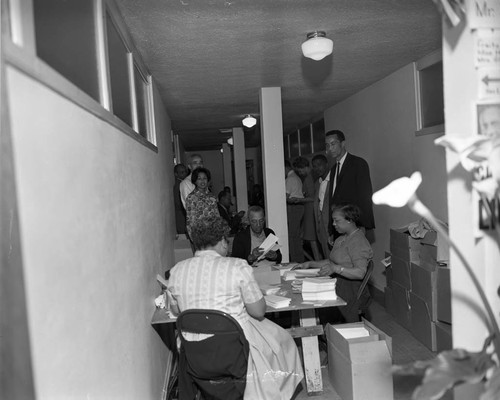 Douglas Dollarhide in an office, Los Angeles, 1963