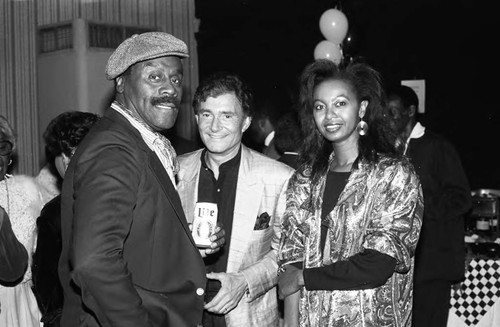 Vidal Sassoon talking with guests at a Communications Bridge Institution event, Los Angeles, 1987