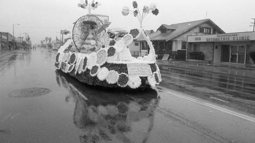 Float traveling on the street during a South Central Los Angeles Easter Parade, Los Angeles, 1982