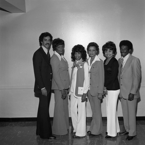 Broadway Federal Savings and Loan staff posing together, Los Angeles, 1974