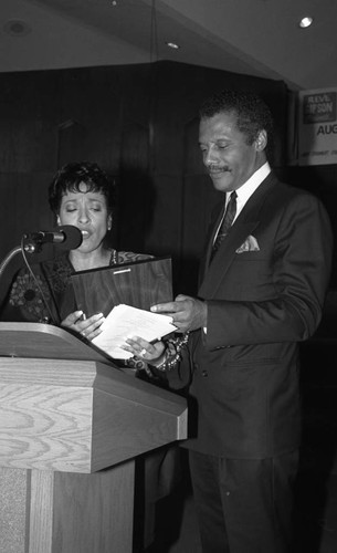 Reve Gipson and Bernard Parks presenting an award during the "Youth on Parade" program, Los Angeles, 1994