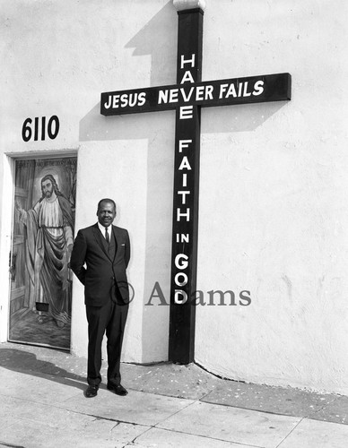 Unidentified man standing in front of Greater Mt. Cavalry Baptist Church, Los Angeles, 1970