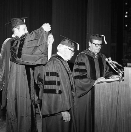 Dr. H. Claude Hudson receiving an honorary doctorate from USC, Los Angeles, 1976