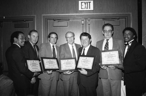 Black Business Association awards recipients posing together, Los Angeles, 1985