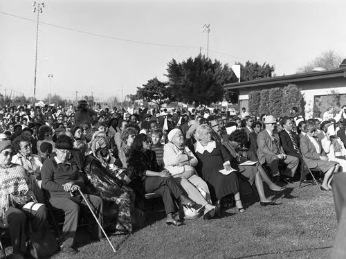 Julian Bond's audience listens to speakers at Darby Park, Inglewood, California, 1985