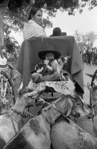 Blessing of the Animals participants posing in a cart, Los Angeles, 1982