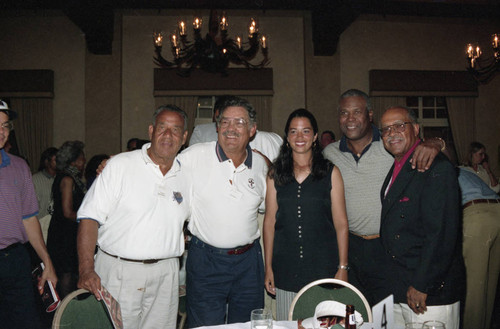 Attendees of the Jackie Robinson Golf Classic posing together inside the Riviera Country Club, Los Angeles, 1994