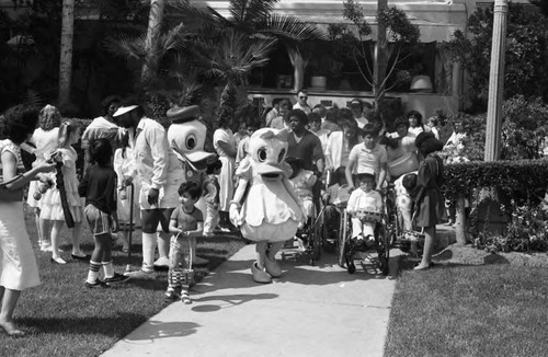 Crippled Children Foundation Easter egg hunt participants gathering together, Los Angeles