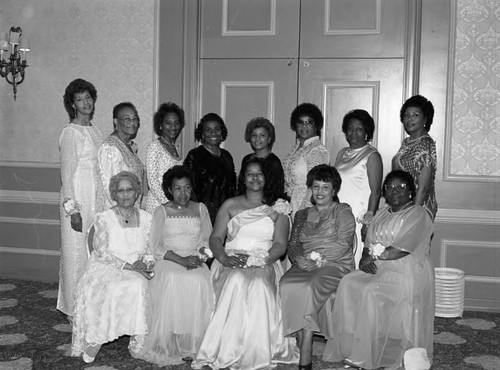 Phi Delta Kappa Bal' Des Amants committee members posing together, Los Angeles, 1987