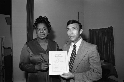 Christ Lutheran Church members posing with certificates, Los Angeles, 1983