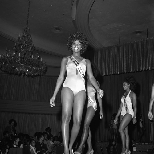 Miss Black America Beauty Pageant contestant Diane Jackson walking on stage, Atlantic City, 1972