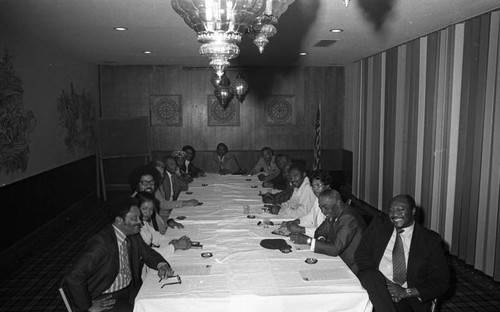 A. Phillip Randolph Institute conference attendees sitting at a table, Los Angeles, 1973