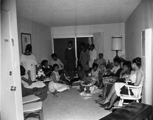 Eula, La Doris and Burnistine McClaney celebrating at a wedding shower, Los Angeles, 1960