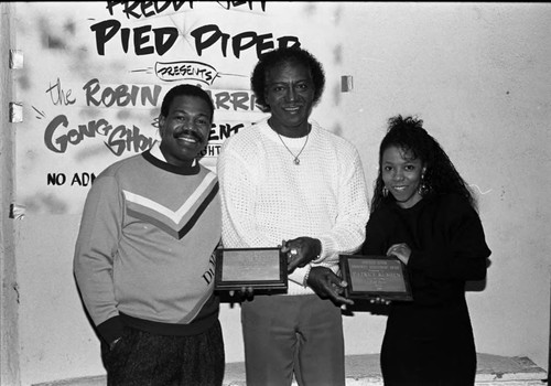 Ndugu Chancler and Patrice Rushen holding awards, Los Angeles, 1989