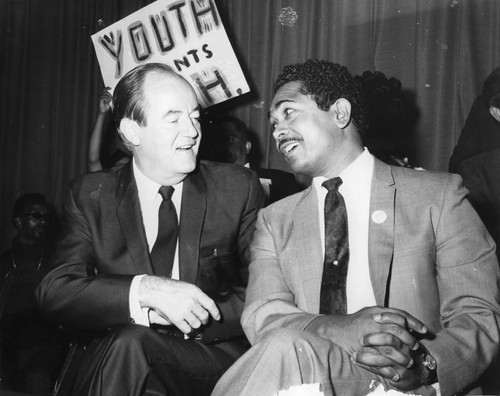 Hubert Humphrey talking with Mervyn Dymally, Los Angeles, ca. 1968