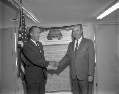 Hahn shaking hands, Los Angeles, ca. 1962