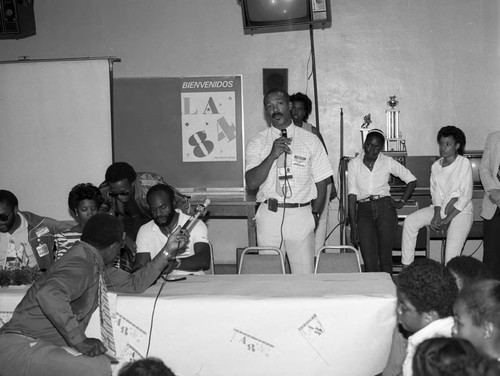 Los Angeles Olympic Organizing Committee members talking to the community, Los Angeles, 1984