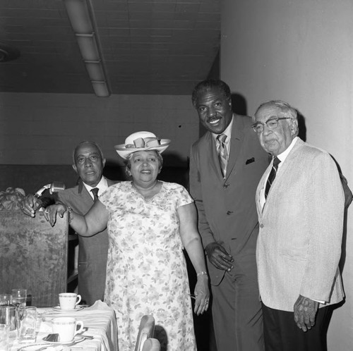 Gilbert and Teresa Lindsay posing with Dr. H. Claude Hudson at the new Kearny Post Office opening, Los Angeles, 1972