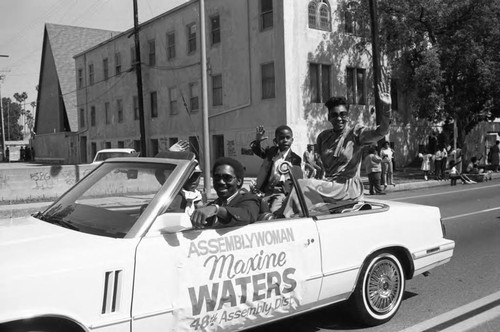 Maxine Waters riding in the 16th annual Easter parade, South Central Los Angeles, 1984