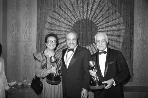 Benjamin Hooks posing with Marion Wright Edleman and David Wolper at the 17th Annual NAACP Image Awards, Los Angeles, 1984