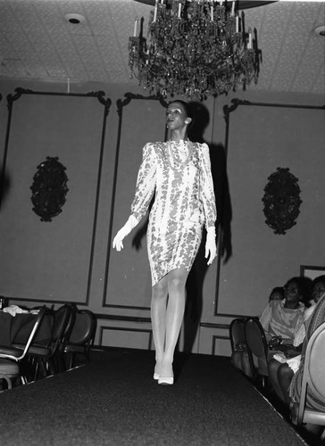 Lula Fields modeling student walking the runway during graduation, Los Angeles, 1985