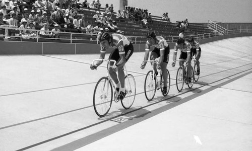 Cyclists racing in a Grand Prix at the Olympic Velodrome's opening, Carson, California, 1982