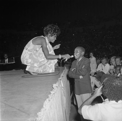 Diana Ross pausing during a performance, Los Angeles, 1969