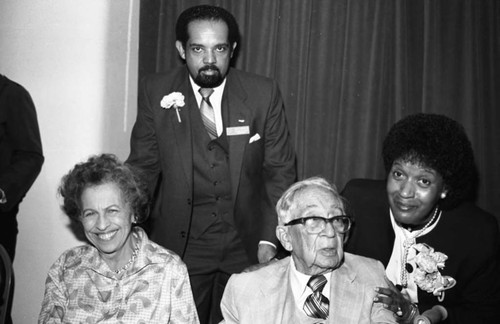 Myrlie Evers posing with Dr. H. Claude Hudson, Los Angeles, 1983