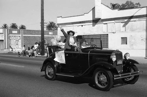 Teresa Hughes riding in the 3rd annual Black History Parade, Los Angeles, 1986