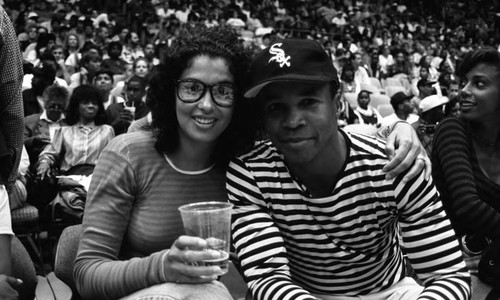 Sugar Ray Leonard posing with Bernadette Robi at the Great Western Forum, Inglewood, 1994