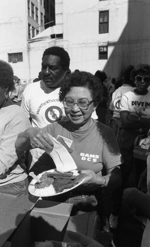 Friends feeding friends, Los Angeles, 1986