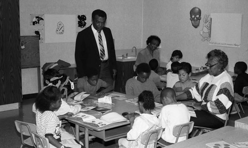 Phi Delta Kappa members helping students at Shenandoah Street School, Los Angeles, 1989